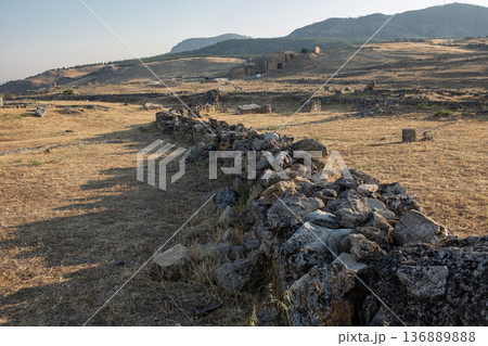 Explore the Ancient Ruins of Pamukkale and Its Unique Landscape Under the Warm Sunlight in Late Afternoon Explore the Ancient Ruins of Pamukkale and Its Unique Landscape Under the Warm Sunlight in Late Afternoon 136889888