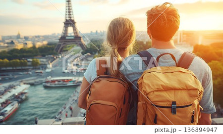 Backpackers Gaze at Eiffel Tower at Sunset, Paris Cityscape View 136894947