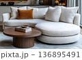 Luxurious Modern Living Room with Curved Sofa, Wooden Table, and 136895491
