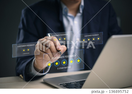 Man hand writing 5 star review customer feedback hologram. Online survey satisfaction evaluation. Best service quality positive. Businessman technology digital interface laptop work dark background. 136895752