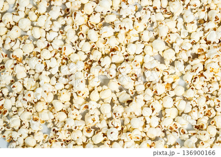 Popcorn as a background image. Advertising concept Popcorn as a background image. Advertising concept 136900166