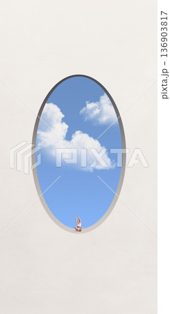 Serene poster. Woman meditating inside oval sky window. Serene poster. Woman meditating inside oval sky window. 136903817