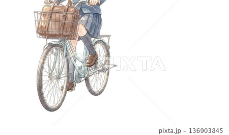 自転車のカゴにスクールバッグを入れて漕ぎ出す足元 136903845