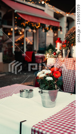 Cozy Outdoor Cafe Tables with Checkered Tablecloths Cozy Outdoor Cafe Tables with Checkered Tablecloths 136905359
