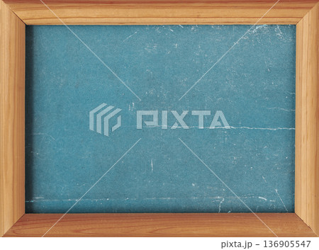 Transformative teal background framed with natural wood, featuring textured teal old surface and rustic wooden border. Transformative teal color trend, modern design, creative copy space 136905547