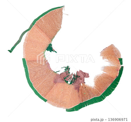 Close up of green pencil wood shaving curl, isolated background Close up of green pencil wood shaving curl, isolated background 136906971