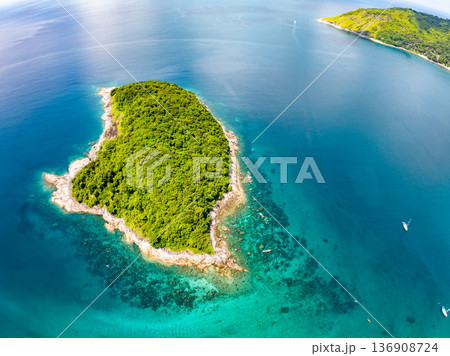 Drone aerial view shot of Tropical sea with beautiful small island in Phuket Thailand Drone aerial view shot of Tropical sea with beautiful small island in Phuket Thailand 136908724