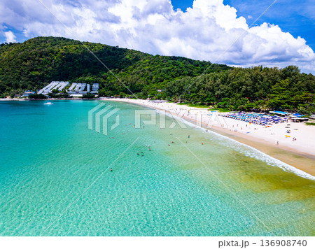 Aerial view of a blue sea surface water texture background and sun reflections Aerial flying drone view Waves water surface texture on sunny tropical ocean Aerial view of a blue sea surface water texture background and sun reflections Aerial flying drone view Waves water surface texture on sunny tropical ocean 136908740