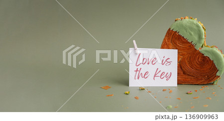LOVE IS THE KEY greeting card Delicious fresh croissant topped with Matcha Green Tea flavor Ganache. Creation unique heart shape bakery. Puff pastry holiday love gift present idea Valentine's day LOVE IS THE KEY greeting card Delicious fresh croissant topped with Matcha Green Tea flavor Ganache. Creation unique heart shape bakery. Puff pastry holiday love gift present idea Valentine's day 136909963