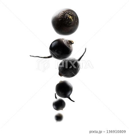 Black turnips levitate on a white background 136910809