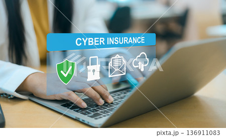 Close up of a business woman using a laptop with virtual cyber insurance interface, featuring security shield, lock, and data cloud icons for digital risk protection concept. Close up of a business woman using a laptop with virtual cyber insurance interface, featuring security shield, lock, and data cloud icons for digital risk protection concept. 136911083