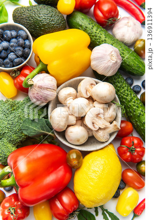 Colorful healthy food variety with fresh fruits and vegetables 136911394