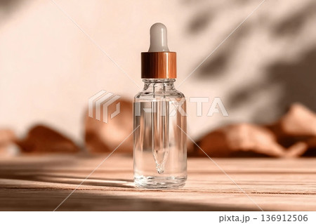 Natural oil cosmetics. Dropper glass Bottle Mock-Up. Oily cosmetic pipette. Face and body treatment. Spa concept. Mineral organic liquid. Front view. Beauty products. Blank packaging on wooden table. Natural oil cosmetics. Dropper glass Bottle Mock-Up. Oily cosmetic pipette. Face and body treatment. Spa concept. Mineral organic liquid. Front view. Beauty products. Blank packaging on wooden table. 136912506