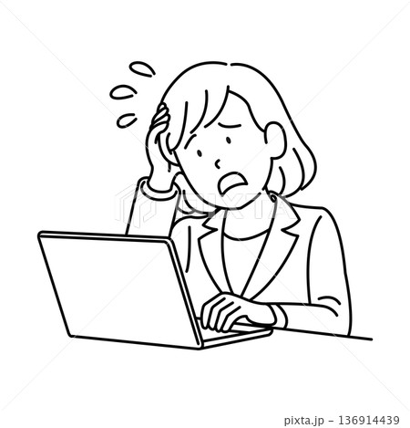 パソコンの前で頭を抱える女性 136914439