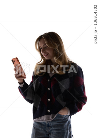 Young woman using smartphone isolated on white background. Young woman using smartphone isolated on white background. 136914502