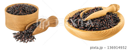 Black rice in wooden bowl and scoop solated on white background with full depth of field Black rice in wooden bowl and scoop solated on white background with full depth of field 136914932