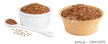 flaxseed in ceramic and wooden bowl isolated on white background. Top view. Flat lay flaxseed in ceramic and wooden bowl isolated on white background. Top view. Flat lay 136914970