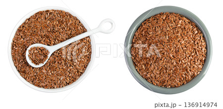 flaxseed in ceramic bowl isolated on white background. Top view. Flat lay 136914974