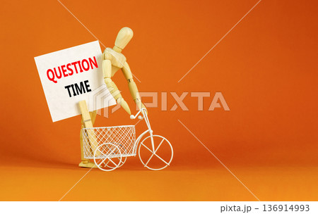 Question time symbol. Concept words Question time on beautiful white paper on wooden clothespin. Bicycle. Beautiful orange background. Business and question time concept. Copy space. 136914993
