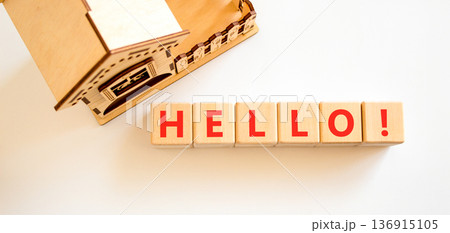 Hello welcome support and help symbol. Concept word Hello on beautiful wooden blocks. Beautiful white background. Beautiful model of house. Business psychological hello support help concept Copy space Hello welcome support and help symbol. Concept word Hello on beautiful wooden blocks. Beautiful white background. Beautiful model of house. Business psychological hello support help concept Copy space 136915105