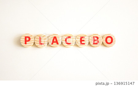 Placebo word medical symbol. Concept word Placebo on beautiful wooden circles. Beautiful white background. Business placebo word medical concept. Copy space. 136915147