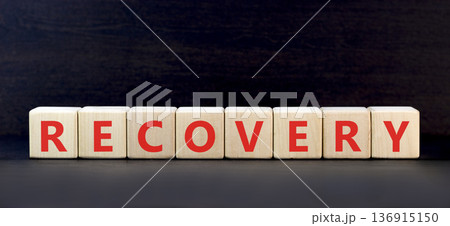 Recovery word symbol. Concept word Recovery on beautiful wooden blocks. Beautiful black background. Business medical support help recovery word concept. Copy space. 136915150