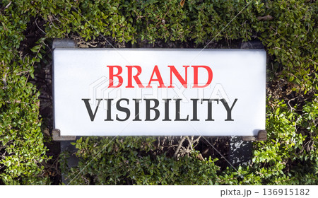 Brand visibility symbol. Concept words Brand visibility on beautiful big white sign plate. Beautiful green garden background. Business branding and brand visibility concept. Copy space. Brand visibility symbol. Concept words Brand visibility on beautiful big white sign plate. Beautiful green garden background. Business branding and brand visibility concept. Copy space. 136915182