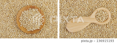 background of sorghum seeds in wooden bowl and spoon. Top view. Flat lay. background of sorghum seeds in wooden bowl and spoon. Top view. Flat lay. 136915193