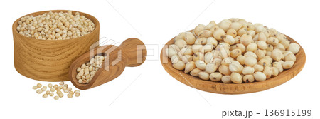 Sorghum seeds in wooden bowl and scoop isolated on white background with full depth of field. Sorghum seeds in wooden bowl and scoop isolated on white background with full depth of field. 136915199