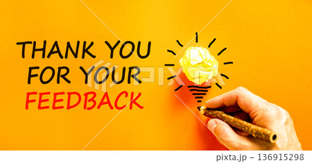 Thank you for your feedback symbol. Concept words Thank you for your feedback on beautiful orange paper. Beautiful orange paper background. Business thank you for your feedback concept. Copy space. 136915298