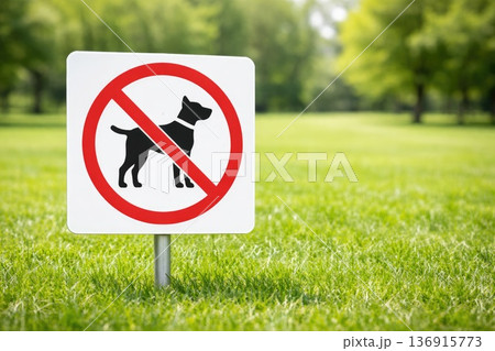 No dogs allowed sign in green park prohibition symbol with pet silhouette 136915773