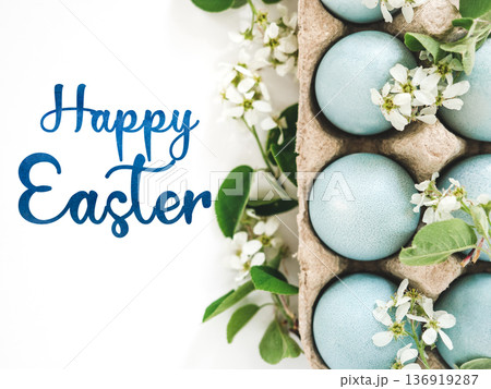 Happy Easter. Pastel blue Easter eggs and congratulatory inscription Happy Easter. Pastel blue Easter eggs and congratulatory inscription 136919287
