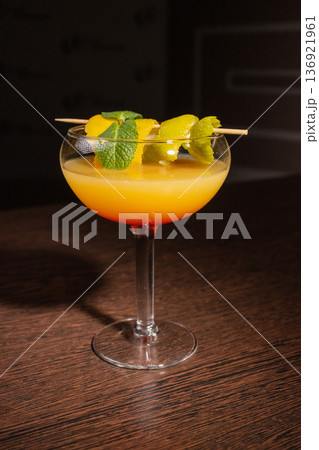 A alcoholic cocktail with orange juice is A alcoholic cocktail with orange juice is 136921961