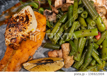 Fried salmon with vegetables and mushrooms Fried salmon with vegetables and mushrooms 136922004