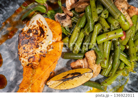 Fried salmon with vegetables and mushrooms Fried salmon with vegetables and mushrooms 136922011