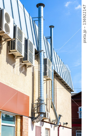 Air vent ducts of air conditioning and ventilation system on the building. Metal pipes of ventilation system Air vent ducts of air conditioning and ventilation system on the building. Metal pipes of ventilation system 136922147