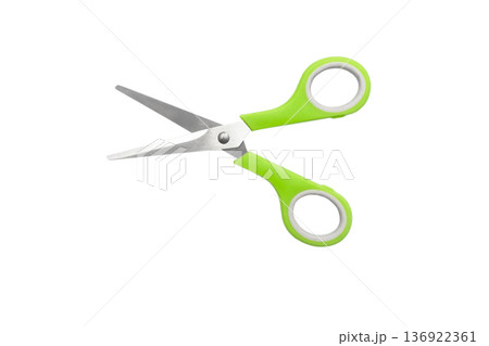 School scissors closed, green handle isolated on white background. School stationery School scissors closed, green handle isolated on white background. School stationery 136922361