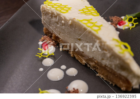 A slice of cottage cheese pie on a plate with 136922395