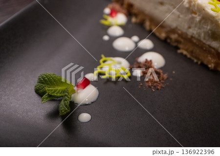 A slice of cottage cheese pie on a plate with 136922396