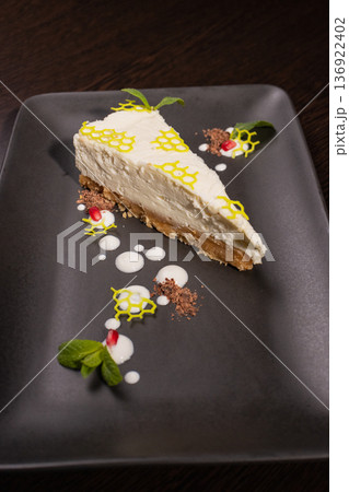 A slice of cottage cheese pie on a plate with A slice of cottage cheese pie on a plate with 136922402