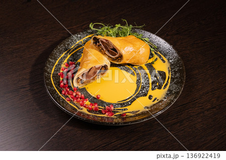 Pancakes with meat filling and sauce Pancakes with meat filling and sauce 136922419