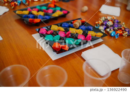 Multicolored candies on the table Multicolored candies on the table 136922490