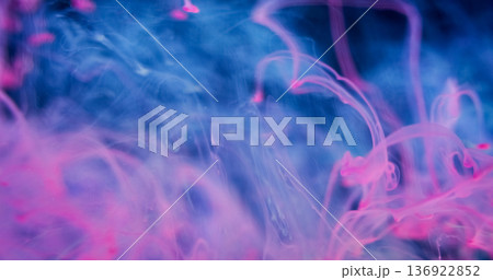 Blur neon smoke. Ink blend. Fluorescent purple blue color blob underwater dissolving. Abstract swirl haze glow tray trickles background. Blur neon smoke. Ink blend. Fluorescent purple blue color blob underwater dissolving. Abstract swirl haze glow tray trickles background. 136922852