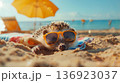Under the shade of an umbrella, a laid-back hedgehog in sunglasses soaks up the beach atmosphere with a carefree spirit. 136923037