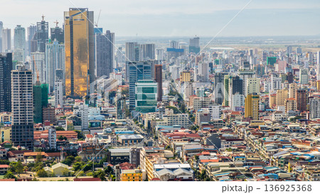 Modern office downtown skyscrapers buildings with residential areas in rapidly developing Phnom Penh central business district panorama, Cambodia 136925368