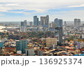 Modern office downtown skyscrapers buildings with residential areas in rapidly developing Phnom Penh central business district panorama, Cambodia 136925374