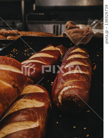 Fresh baked loaves with glossy crust Fresh baked loaves with glossy crust 136926739