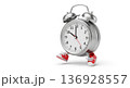 Alarm clock running in red sneakers symbolizing urgency 136928557