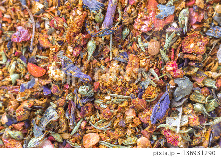 Abstract textured natural bright orange colorful copy space background. Millet, oak, different grains small particles, fish and parrot food. 136931290