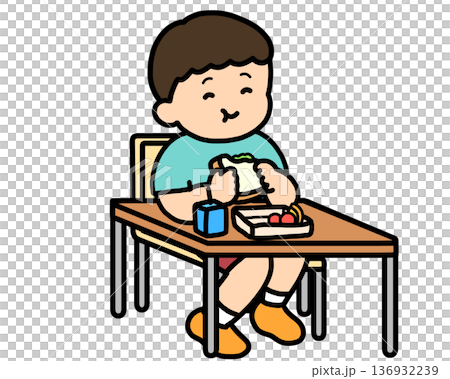 ランチタイム　机でサンドイッチを食べるアジア人の男の子 136932239